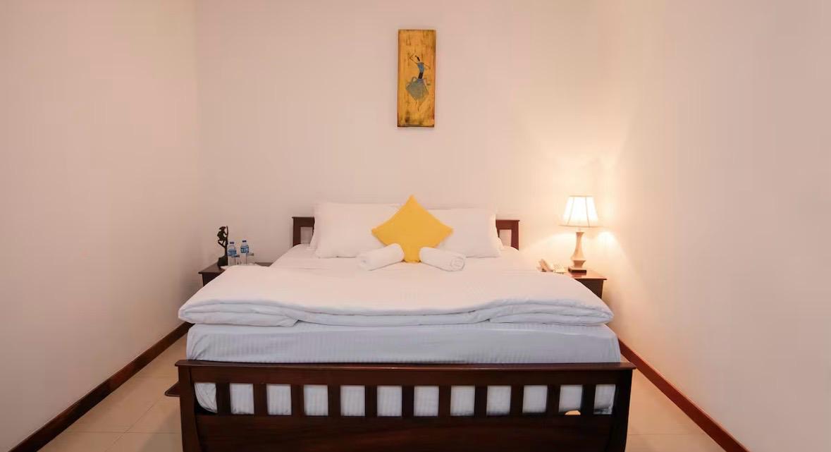 Spacious bedroom with king size bed
